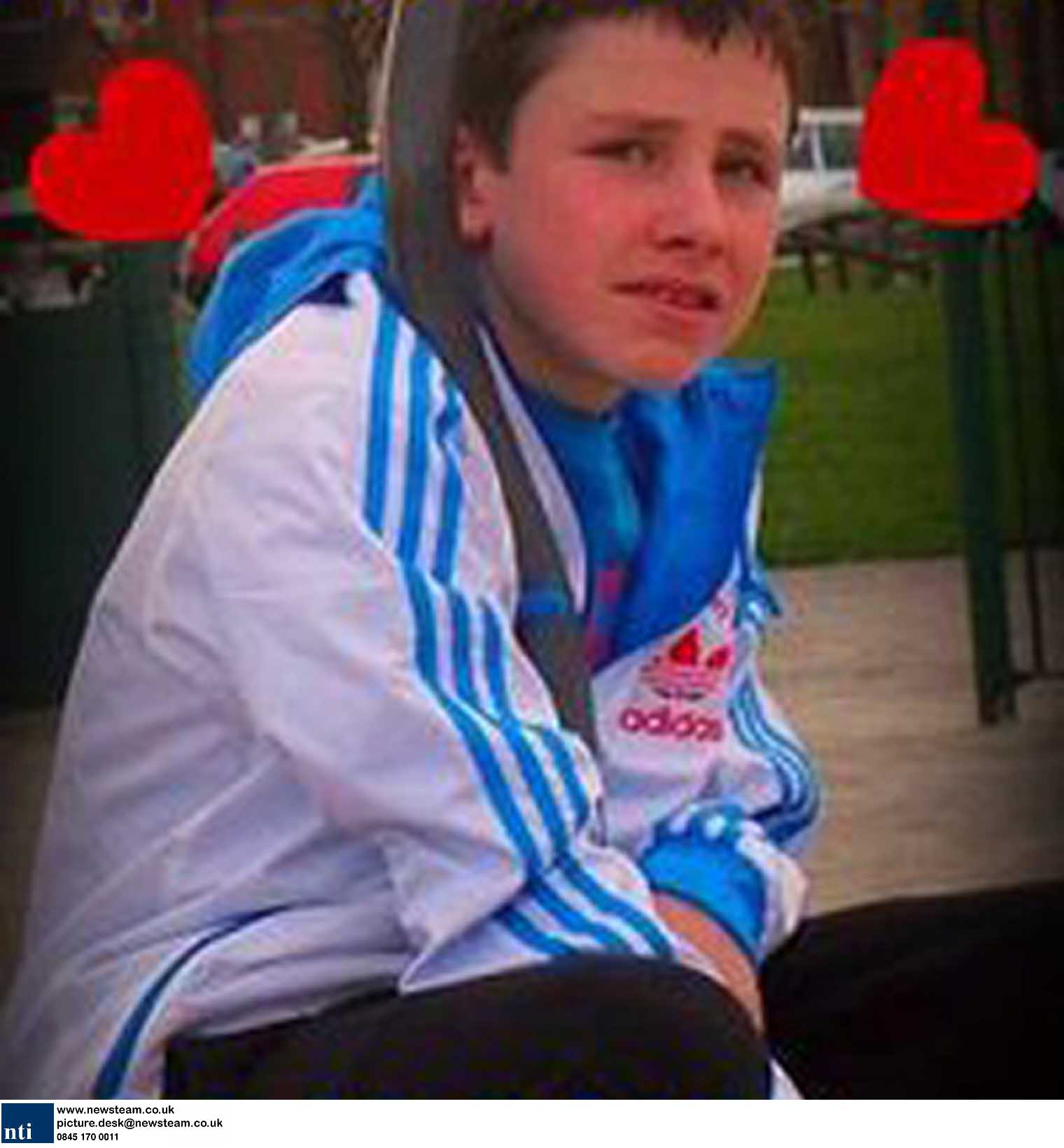 Teenager dies after car crashes through garden fence