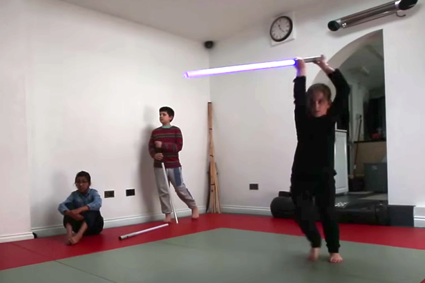 JEDI TEACHES CHILDREN WAY OF THE FORCE AND HOW TO USE LIGHTSABERS