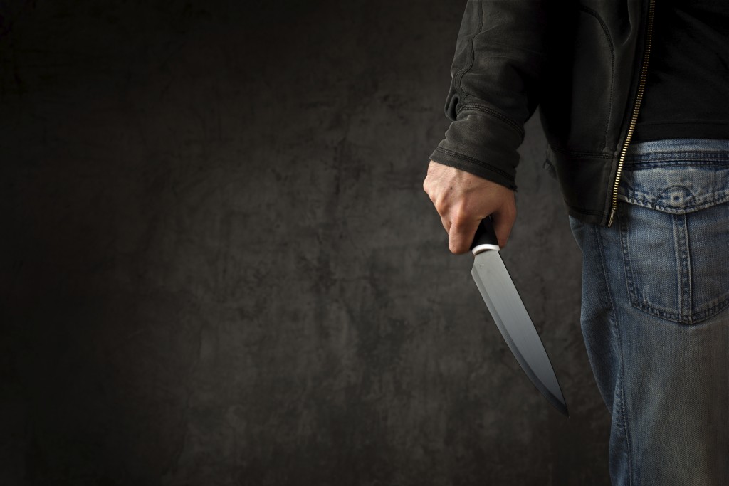 SHOPPERS FLEE AS MAN SLASHES HIMSELF WITH SWORD IN COVENTRY