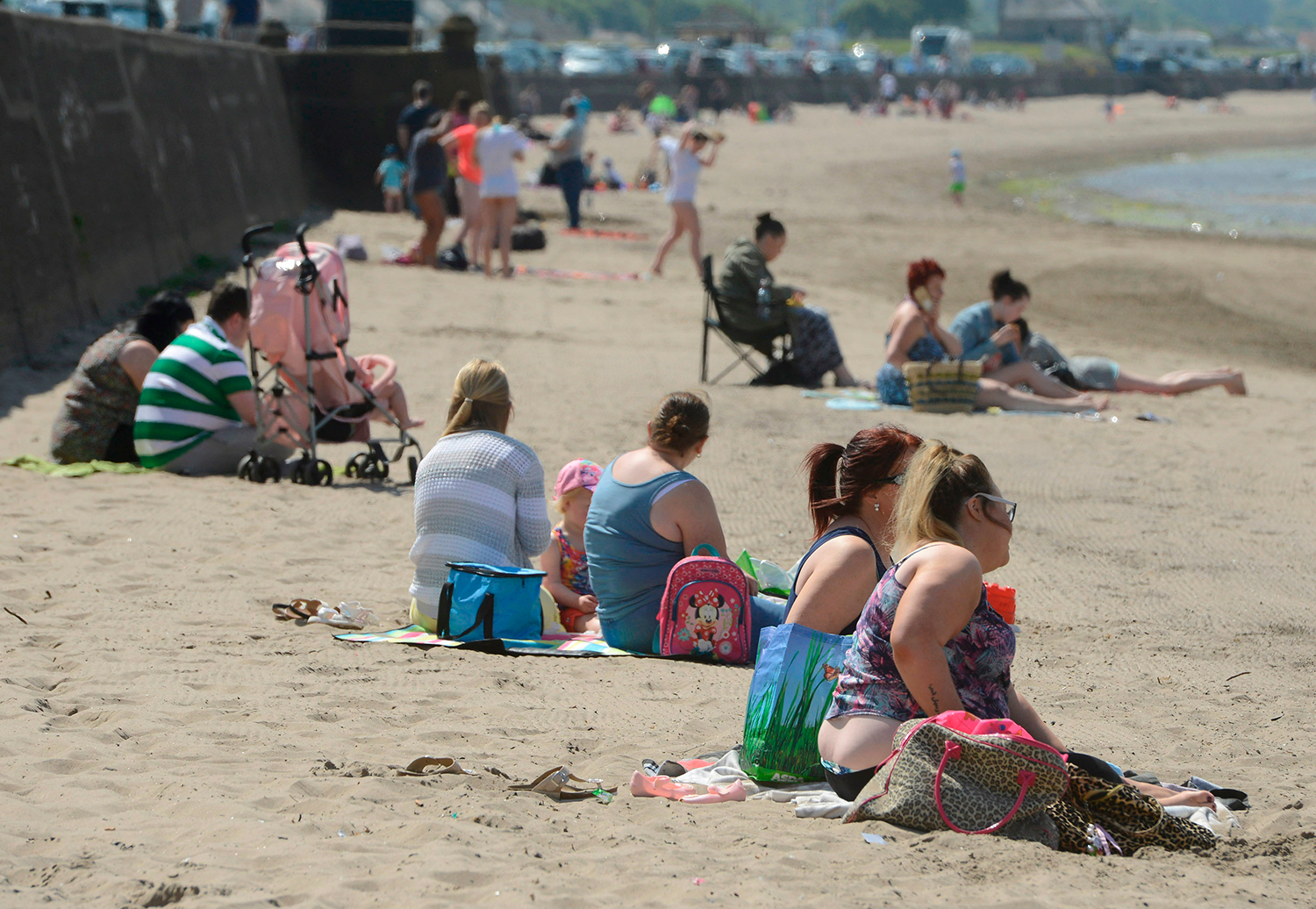 SCOTS SOAK UP GLORIOUS SUNSHINE AT BEACH