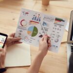 Generalist Agencies Rarely Match the Speed of Industry-Seasoned SEO Teams: marketing specialists reviewing SEO and campaign analytics charts at a desk